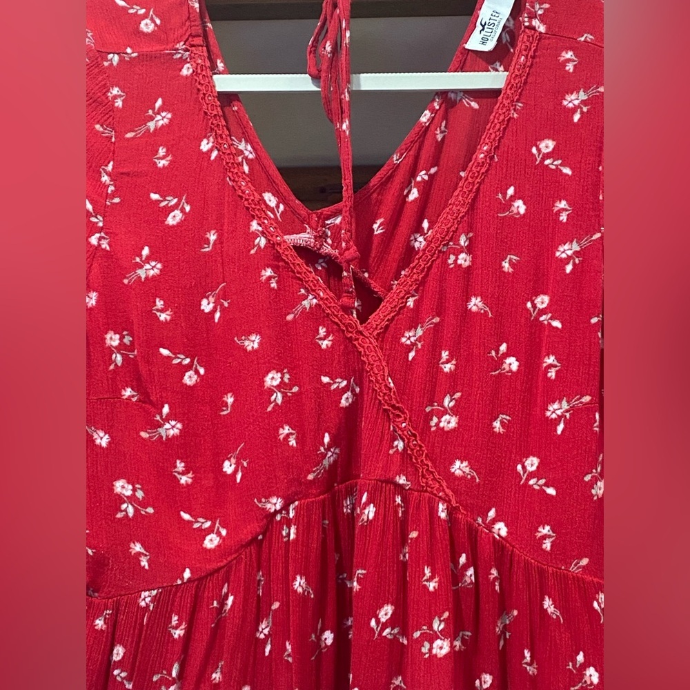 4/$25*Hollister, featuring a V-neck, peplum hem, and long flared sleeves. L - Picture 3 of 7